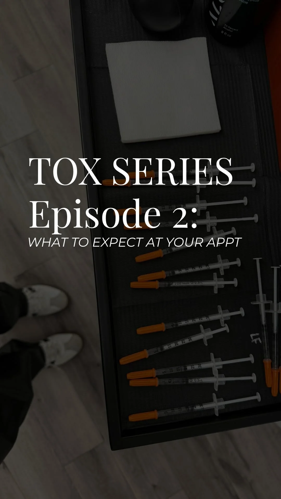 The injection tray before a first Botox appointment at MODE Aesthetics and Wellness in Scottsdale: pre drawn syringes on a black mat with gauze and alcohol prep, the title card of Torey Varner, RN's reel on what to expect.